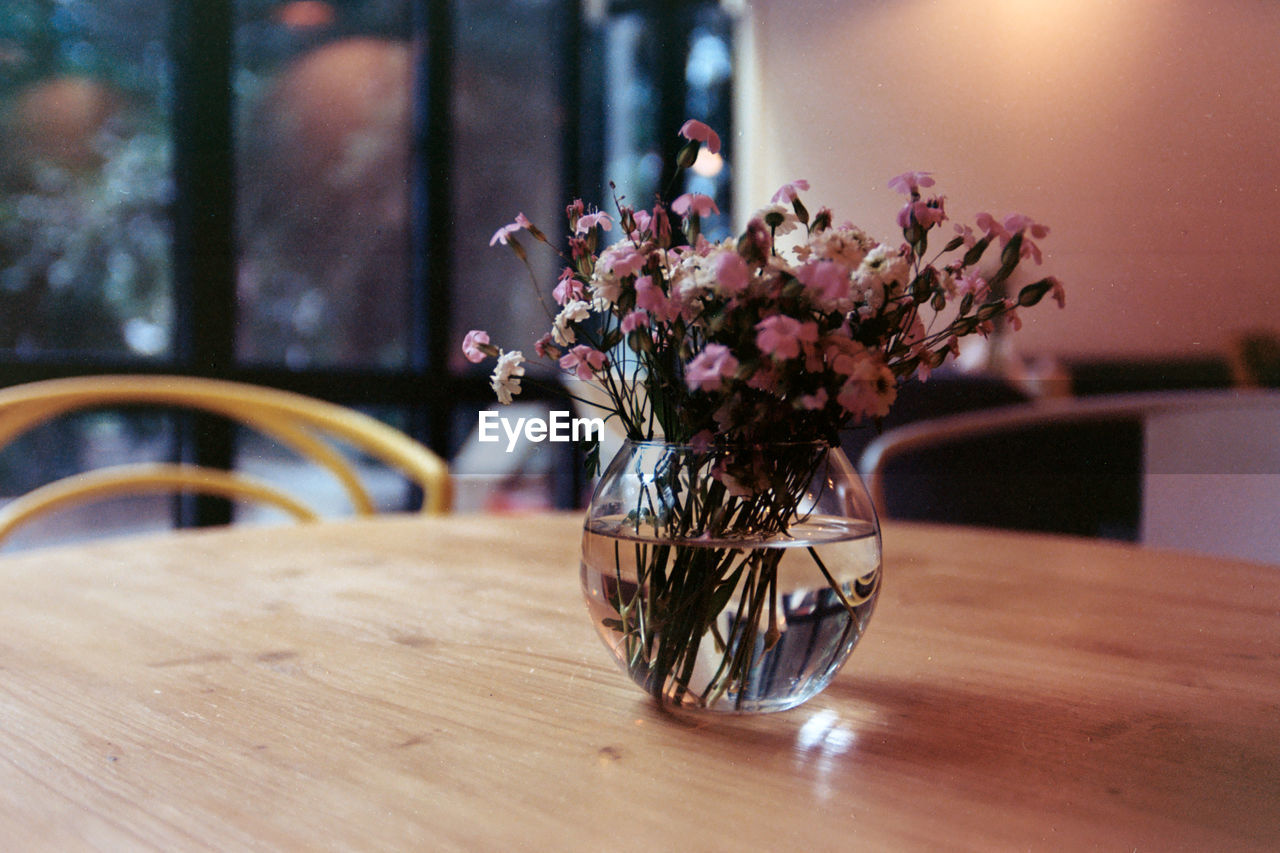 Close-up of flower vase on table