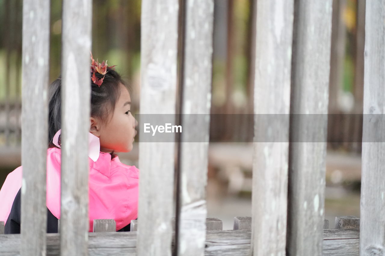 PORTRAIT OF GIRL LOOKING AWAY