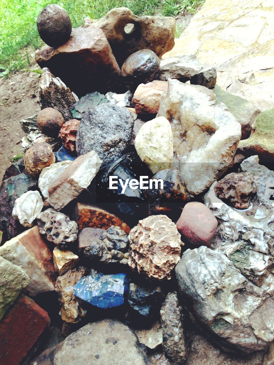 High angle view of rocks on field