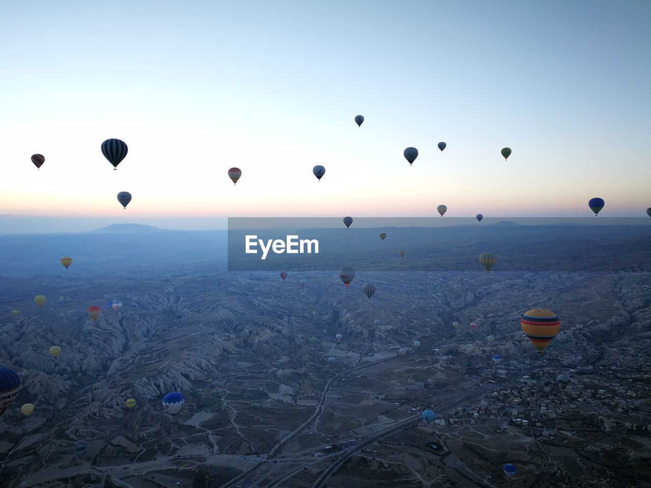 View of hot air balloons flying in sky