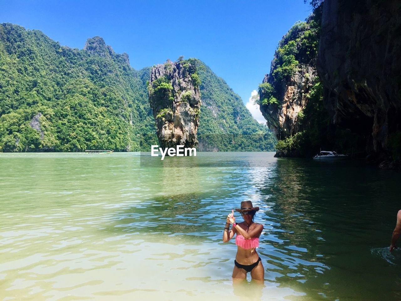 Woman standing in sea