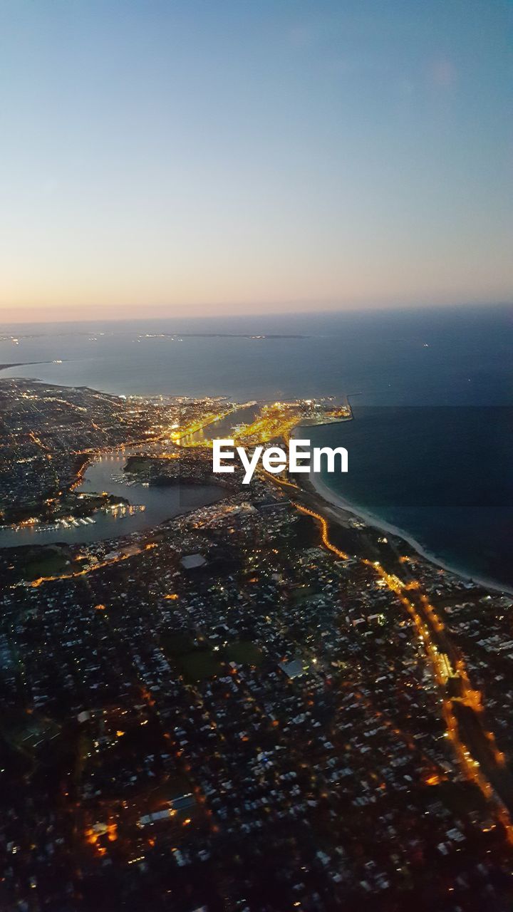 AERIAL VIEW OF CITYSCAPE BY SEA