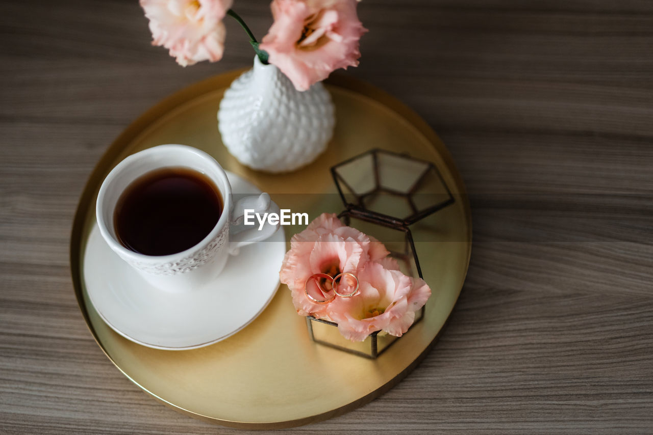 high angle view of coffee on wooden table