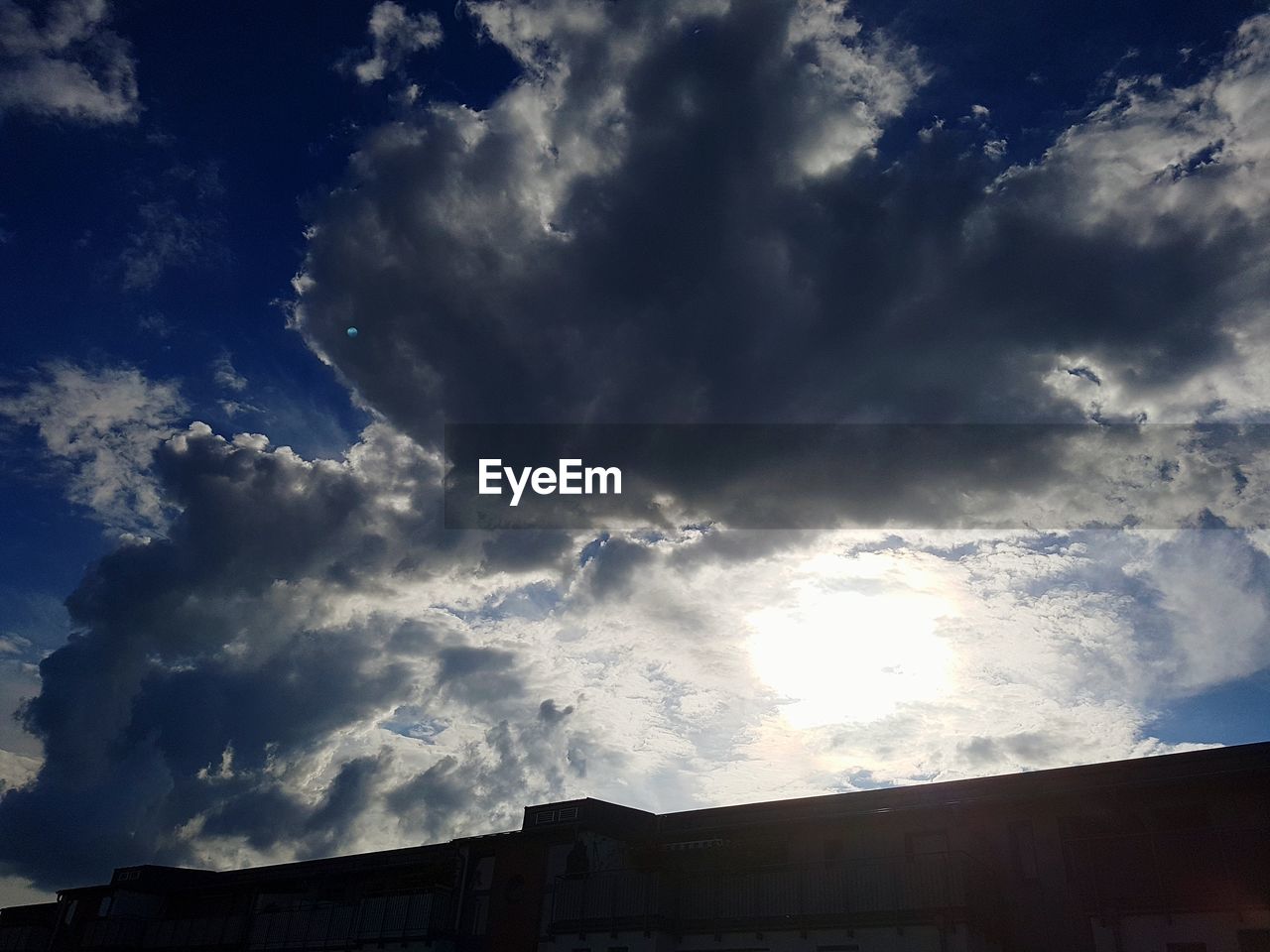 LOW ANGLE VIEW OF SKY OVER CLOUDS