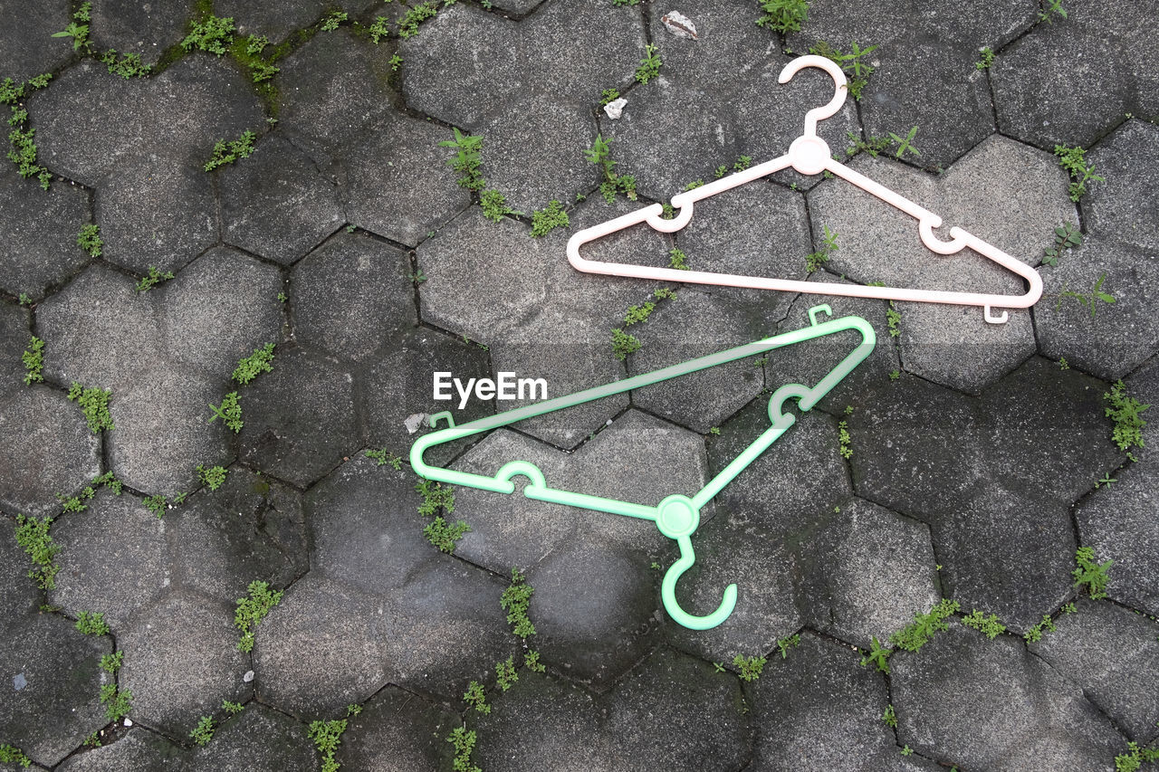 High angle view of hangers on street