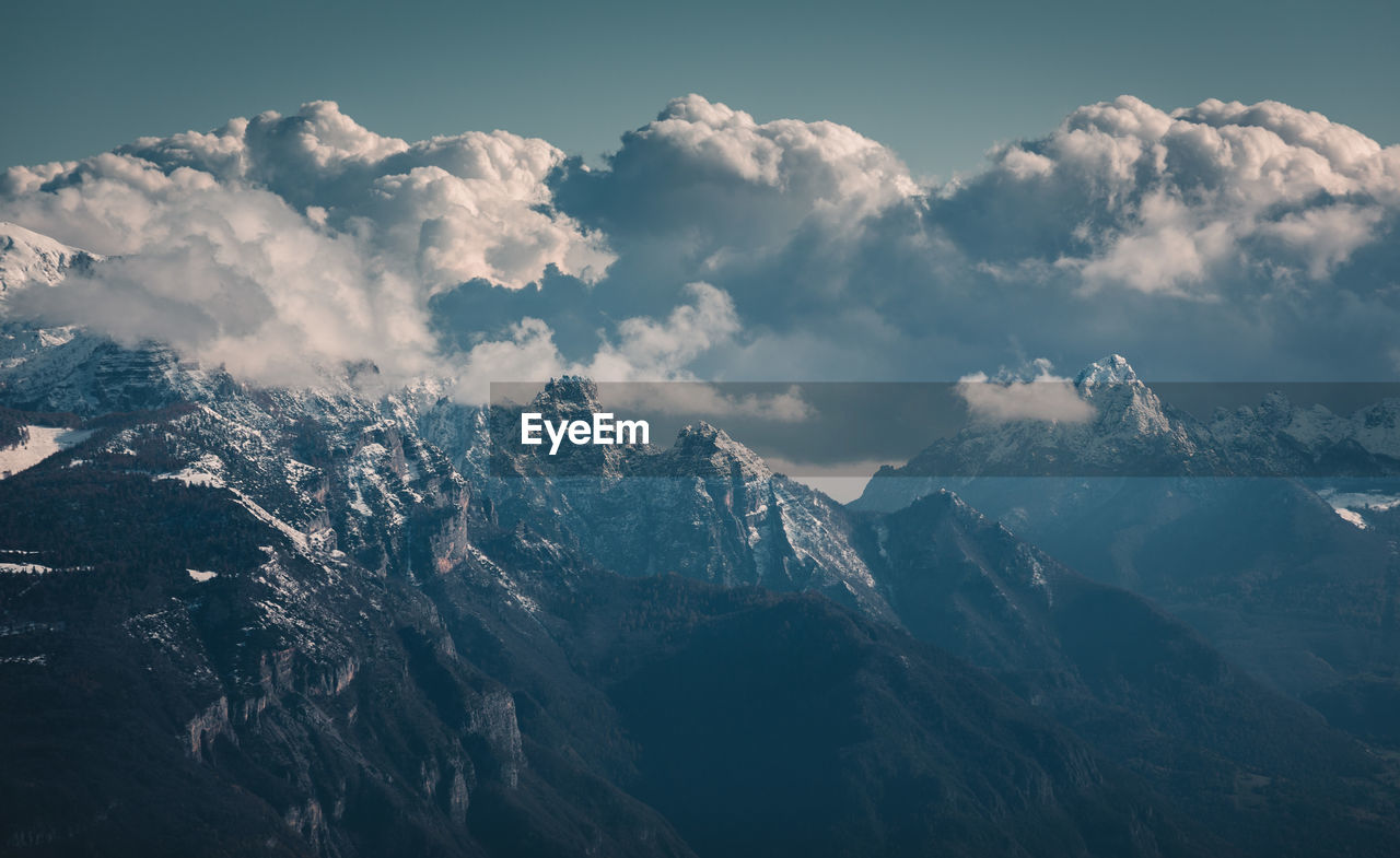 Scenic view of snowcapped mountains against sky