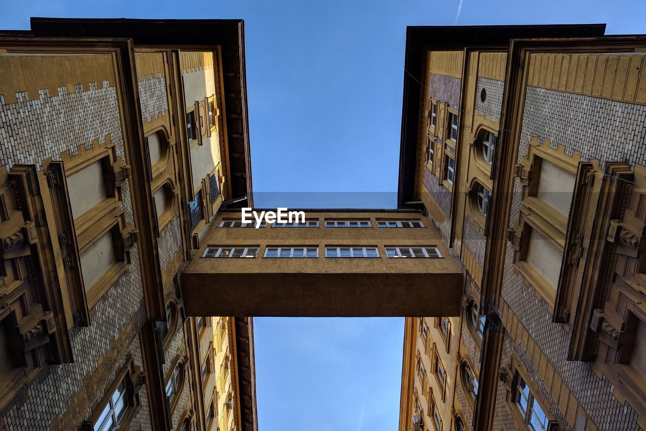 Low angle view of old building against sky