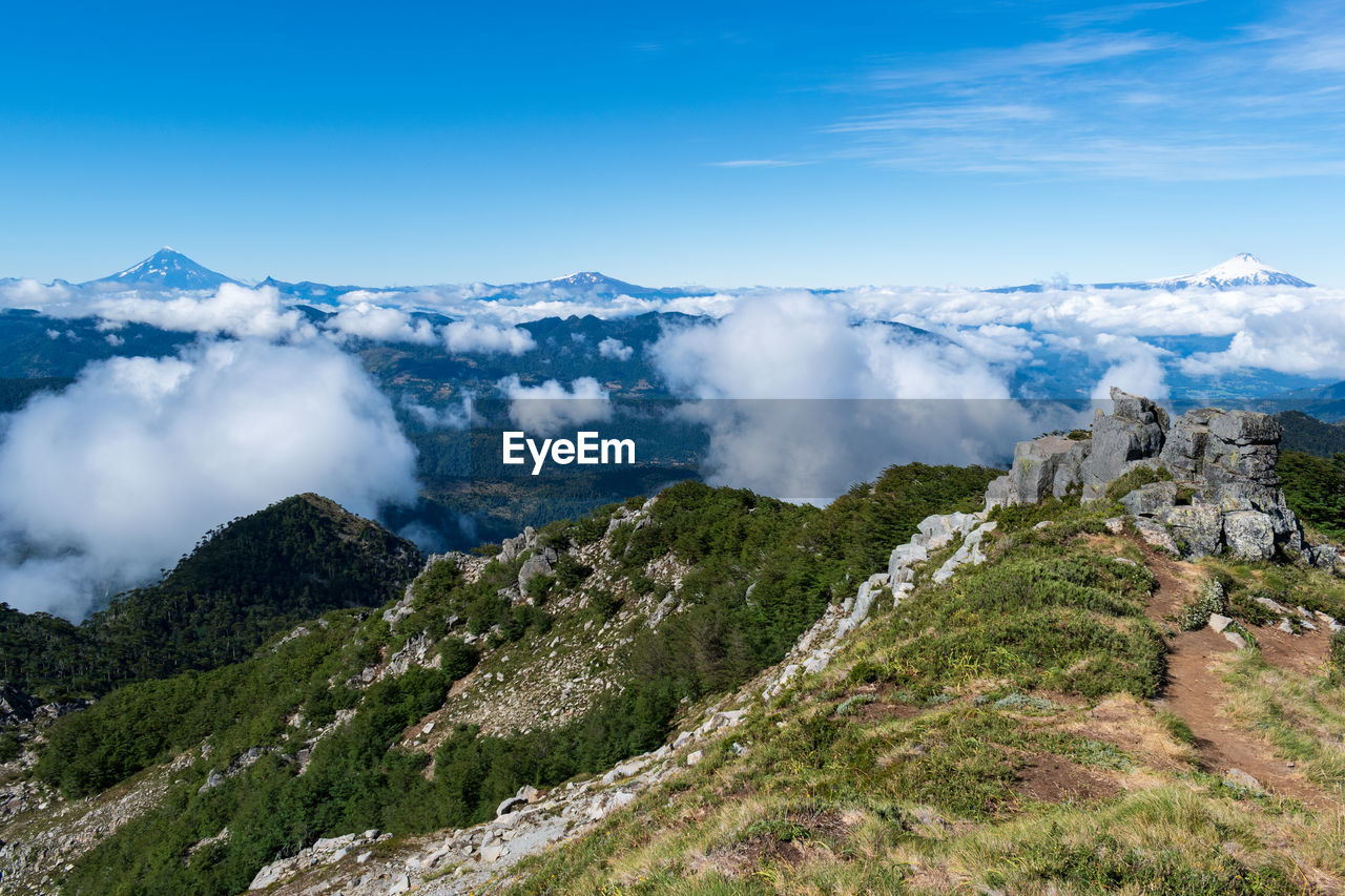 Scenic view of clouds over mountain