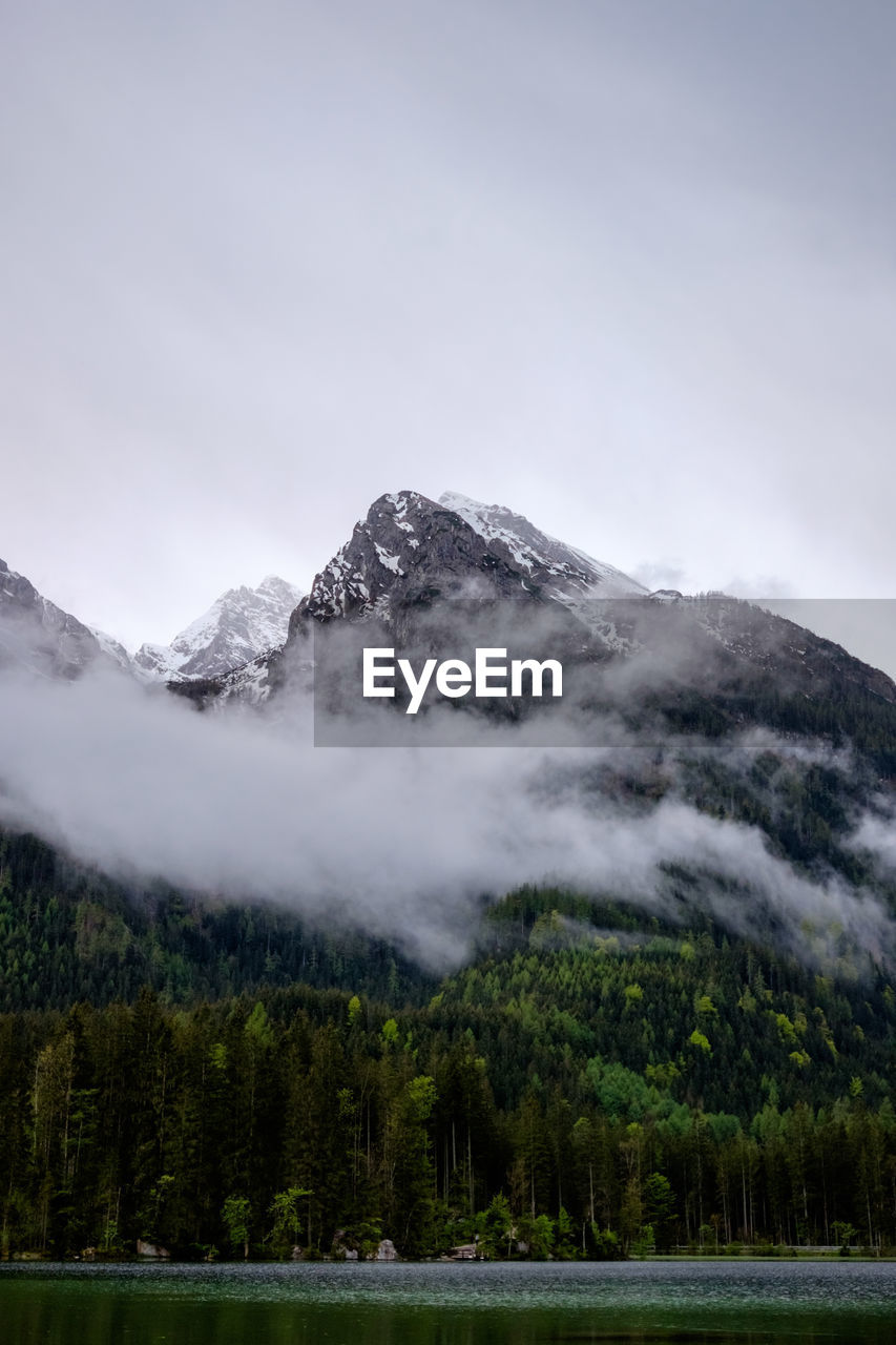 SCENIC VIEW OF SNOWCAPPED MOUNTAIN AGAINST SKY