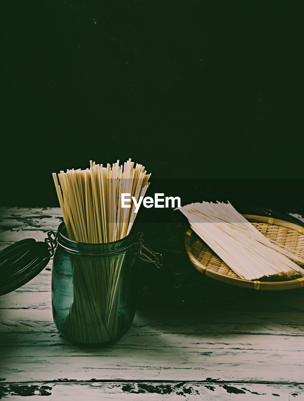 CLOSE-UP OF FOOD ON TABLE BY MOORED IN WATER