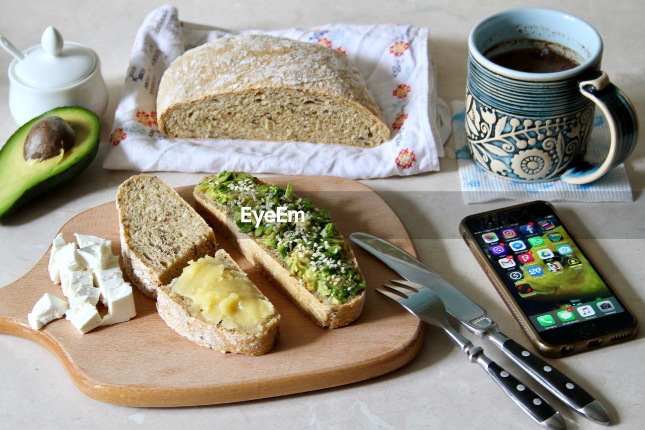 HIGH ANGLE VIEW OF BREAKFAST IN COFFEE