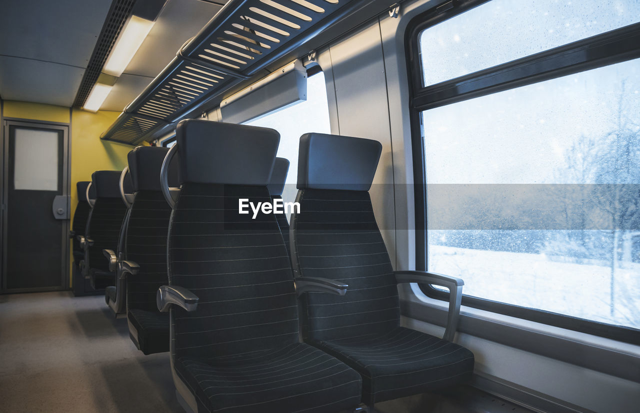 VIEW OF TRAIN IN EMPTY SEATS