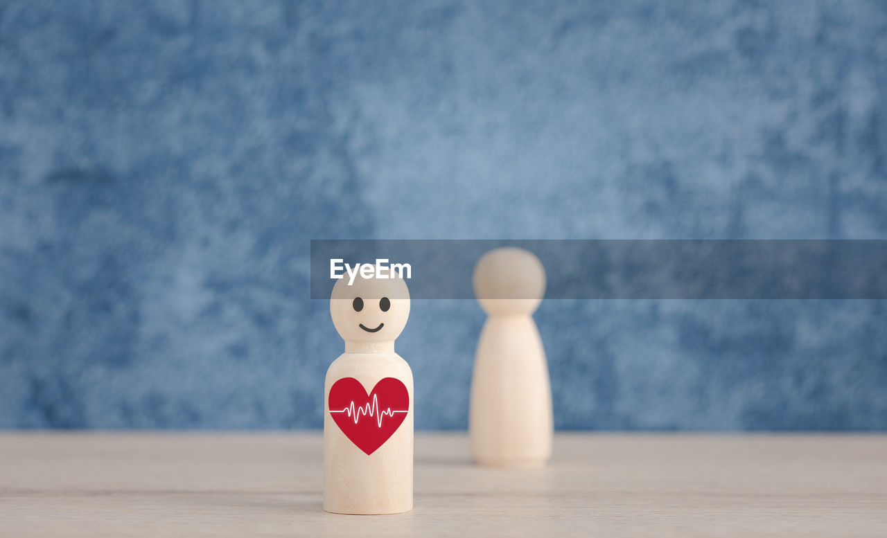 CLOSE-UP OF STUFFED TOY ON TABLE