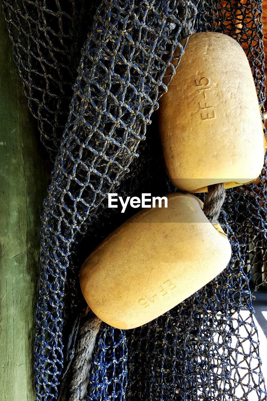 HIGH ANGLE VIEW OF EGGS IN BOX