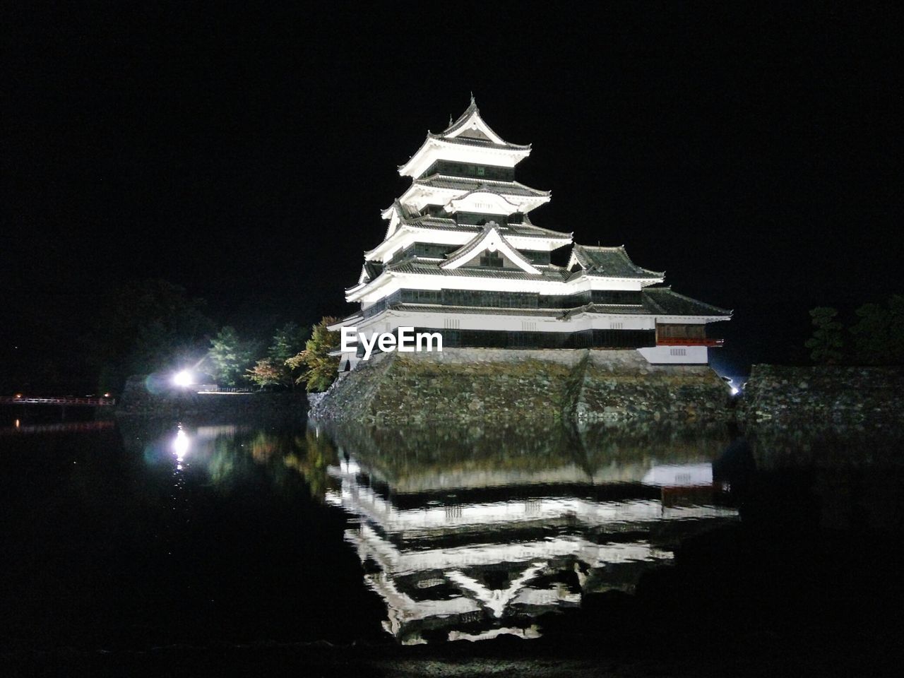 ILLUMINATED TEMPLE AGAINST SKY