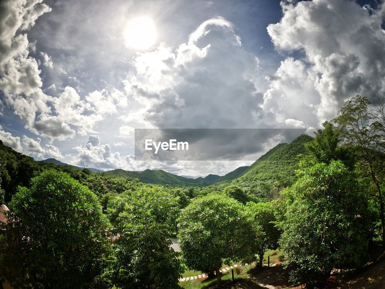 SCENIC VIEW OF LANDSCAPE AND MOUNTAINS AGAINST SKY