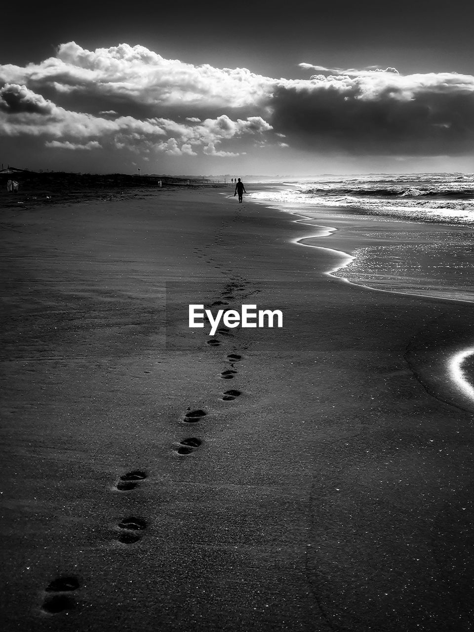 sea, beach, land, water, sky, black and white, cloud, horizon, monochrome, monochrome photography, darkness, nature, wave, beauty in nature, scenics - nature, sand, ocean, white, black, tranquility, coast, light, holiday, reflection, vacation, trip, outdoors, tranquil scene, environment, motion, horizon over water, travel destinations, shore, wind wave, sunlight, sports, travel, silhouette, landscape, dramatic sky