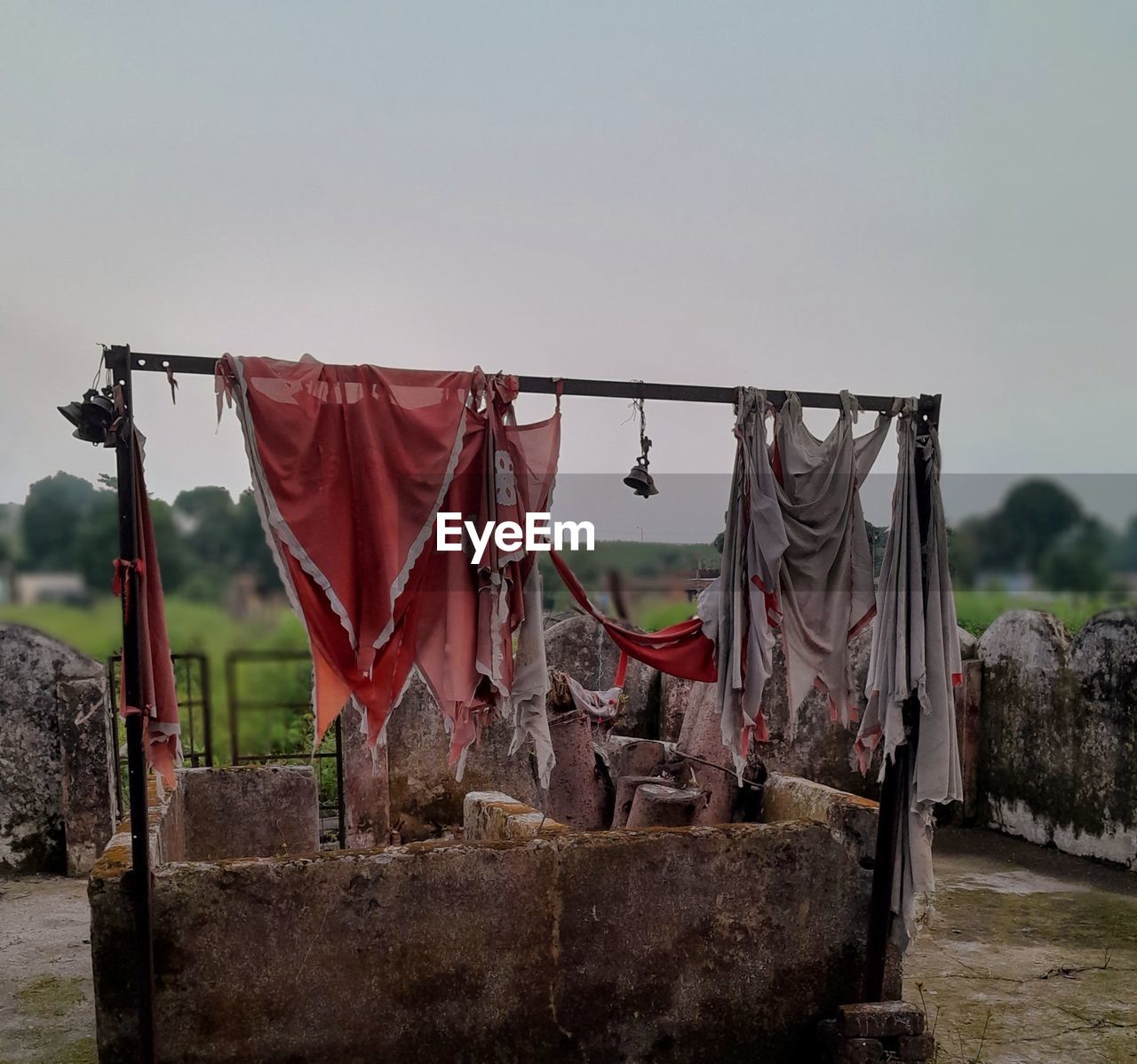 drying, sky, nature, no people, clothesline, rural area, hanging, laundry, day, architecture, outdoors, tree, environment, clothing, built structure, water