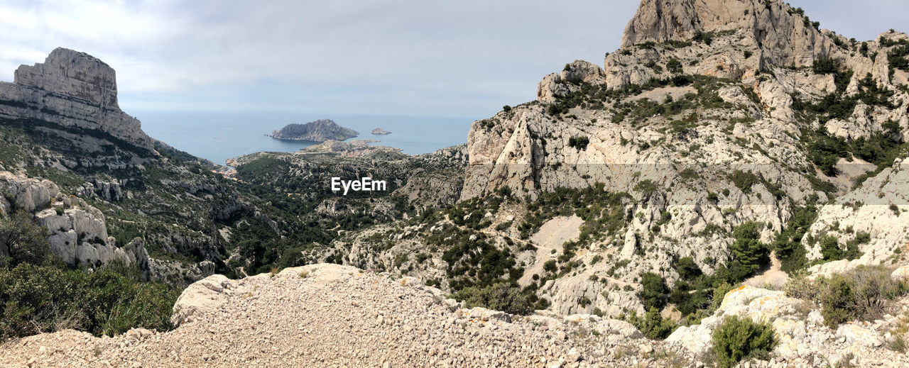 scenics - nature, sky, rock, landscape, environment, mountain, nature, beauty in nature, travel destinations, land, cloud, travel, rock formation, adventure, plant, tree, non-urban scene, panoramic, geology, no people, wadi, tourism, mountain range, tranquility, walking, valley, outdoors, wilderness, tranquil scene, pine tree, cliff, coniferous tree, pinaceae, leisure activity, activity, extreme terrain, day, ridge, plateau, animal wildlife, mountain peak, semi-arid, outdoor pursuit, terrain, sunny, pine woodland