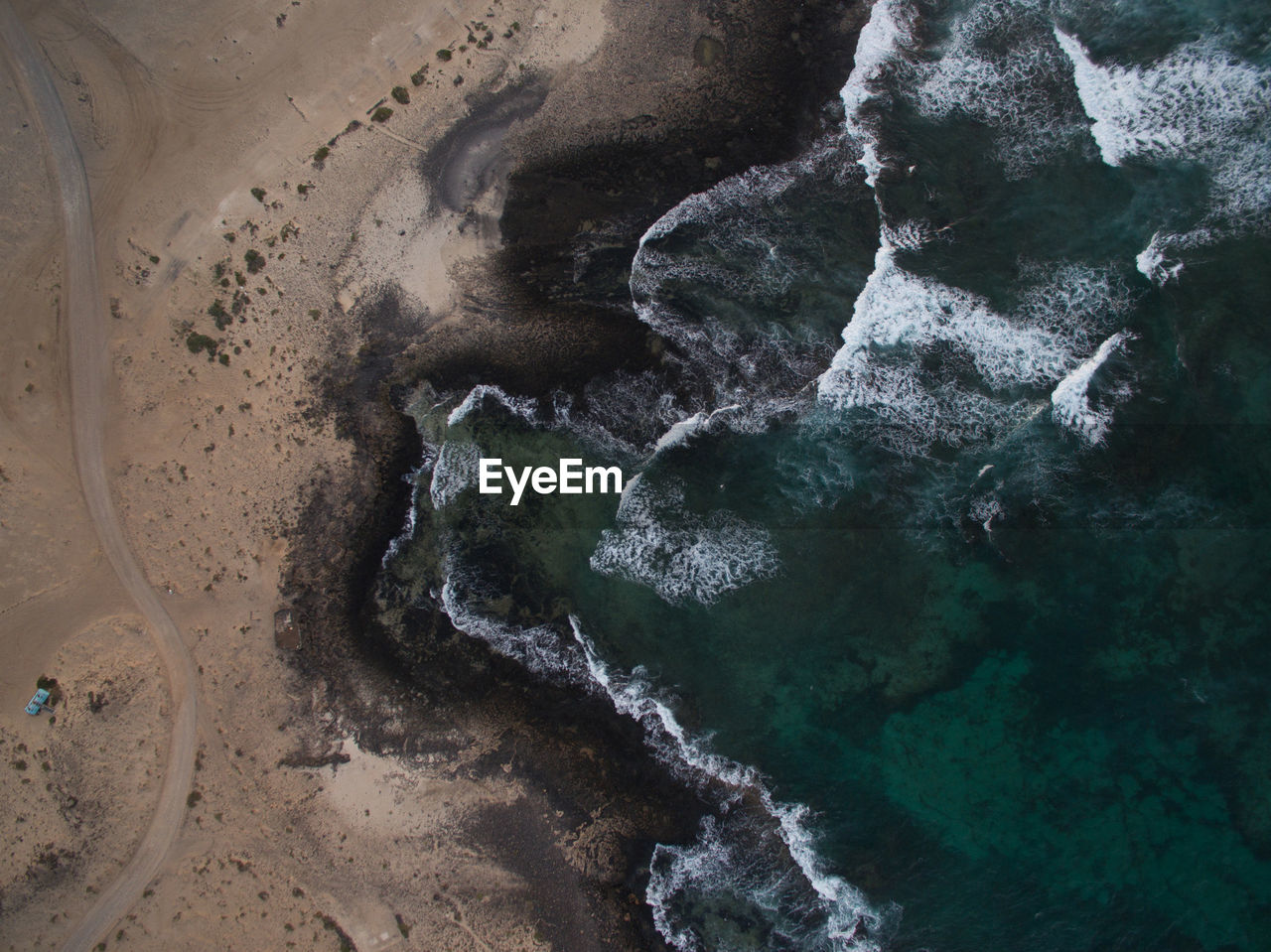 HIGH ANGLE VIEW OF SHORE