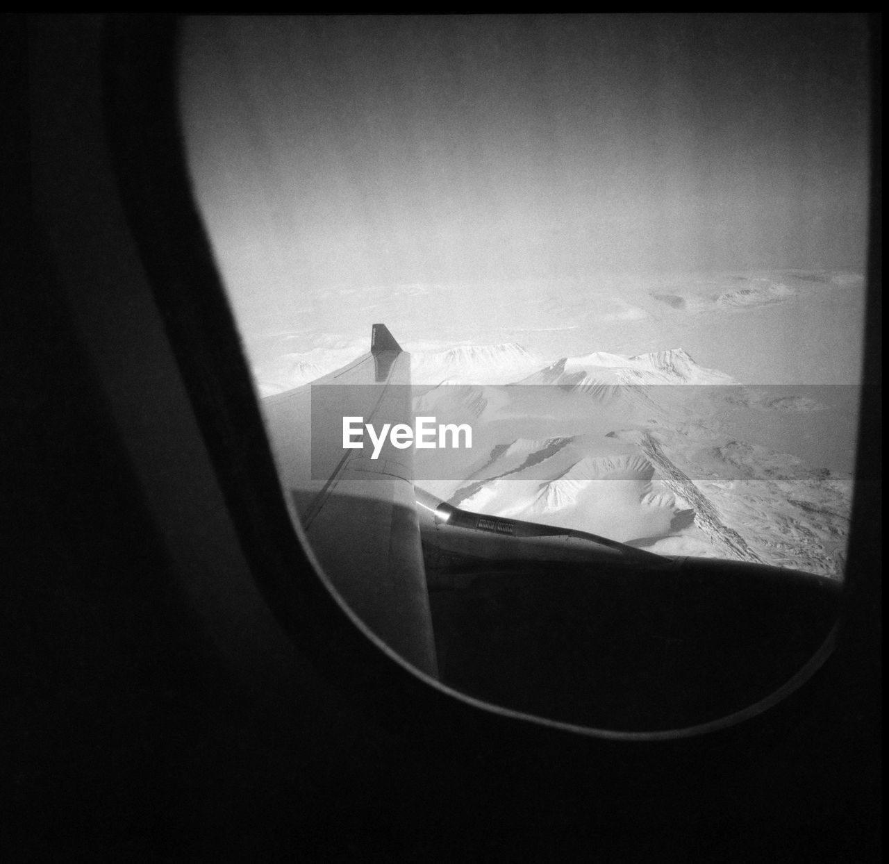 The end of the world Analogue Photography Arctic Arctica Black And White Climate Change Flight Glacier Grain Greenland Lomography Mountains Nature No People Northpole Plane Plane Window Polar Flight Snow And Ice  Trip Turbine Window Wings Winterland