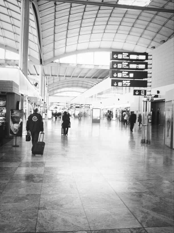 PEOPLE WAITING IN SUBWAY STATION