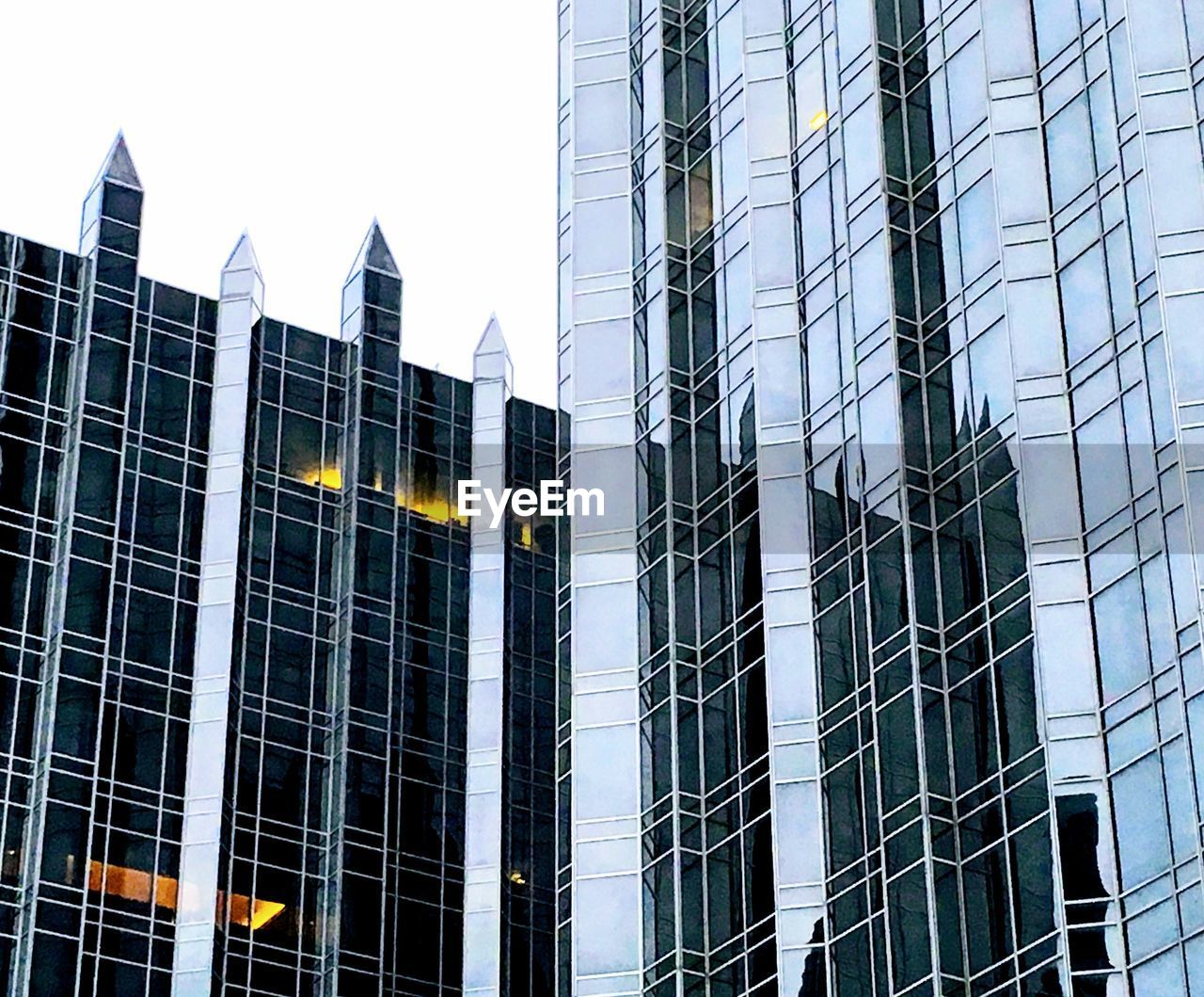 Low angle view of skyscrapers against sky