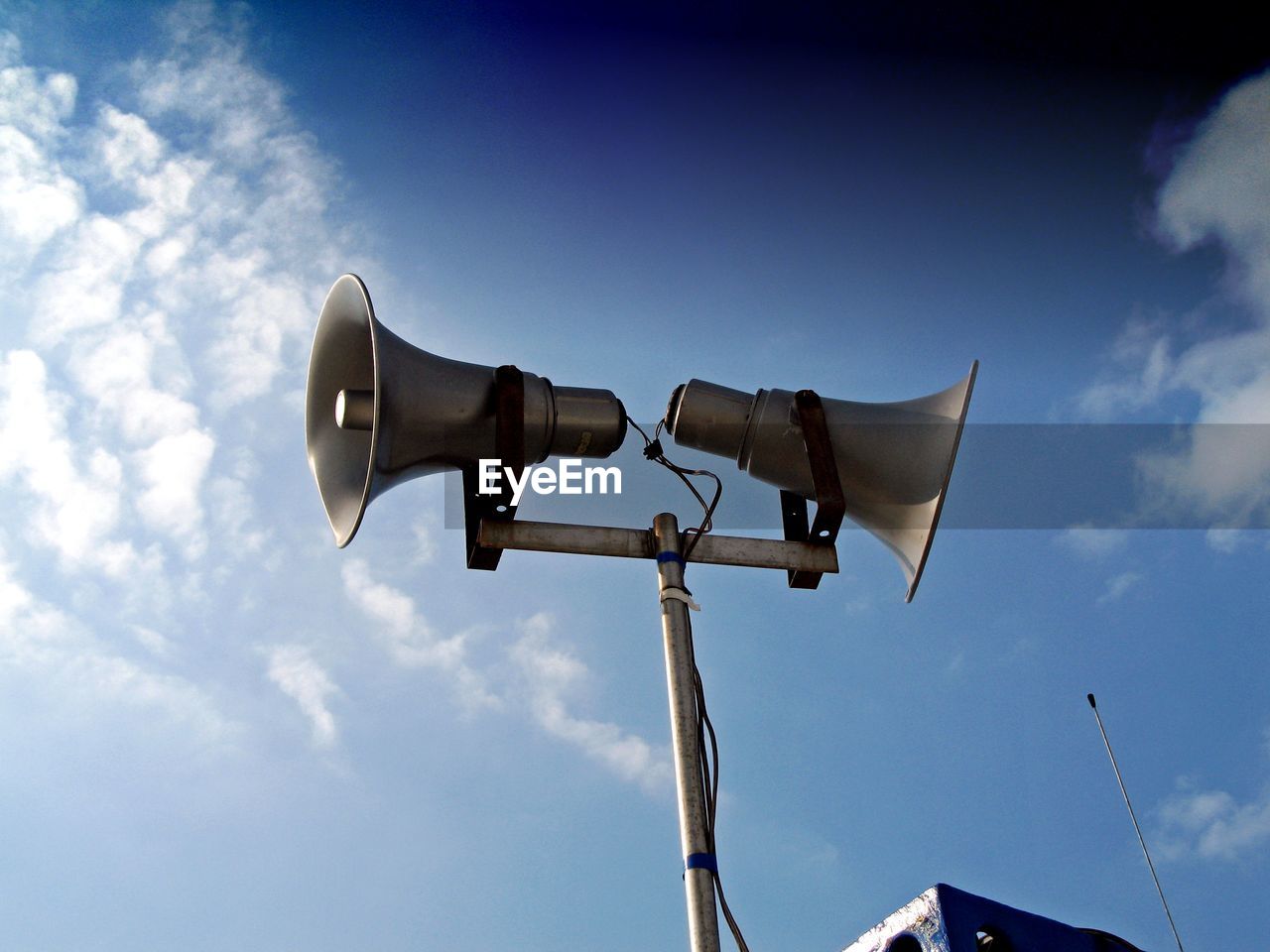 Low angle view of two megaphones