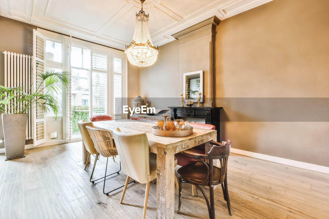 empty chairs and table in kitchen