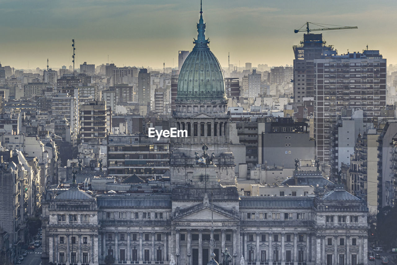 BUILDINGS IN CITY AGAINST SKY