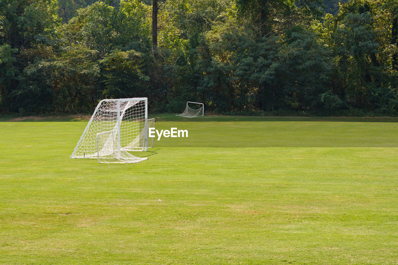 EMPTY BENCH ON FIELD