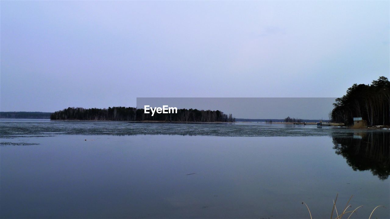 LAKE AGAINST CLEAR SKY