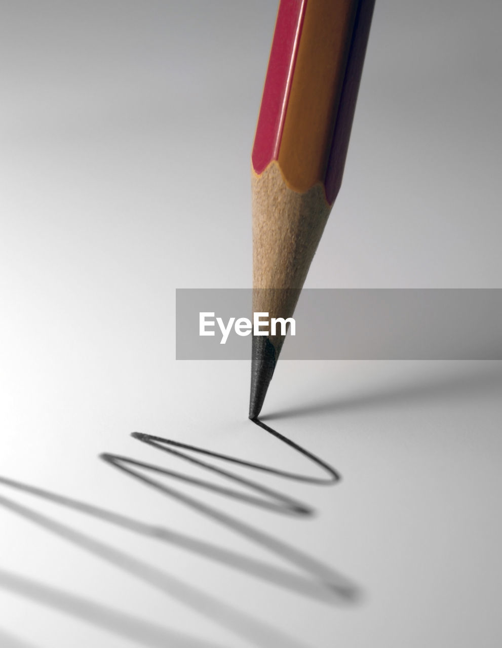 HIGH ANGLE VIEW OF PENCILS IN PEN