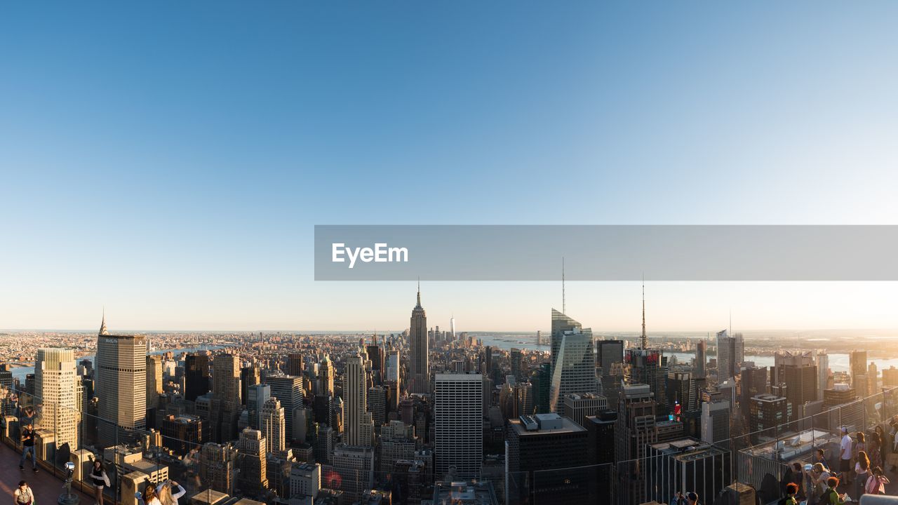 View of cityscape against clear sky