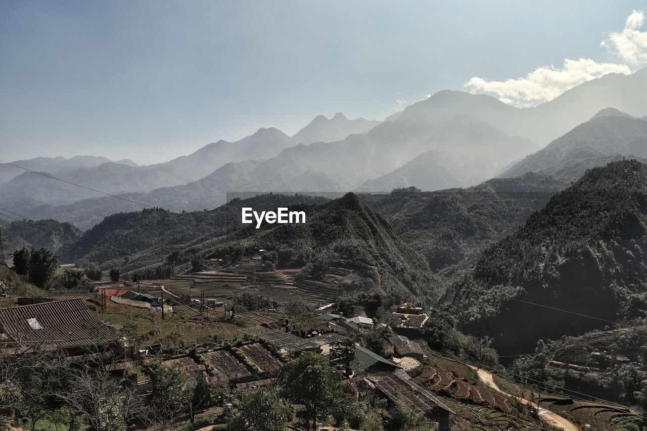 Scenic view of mountain range against sky in sapa