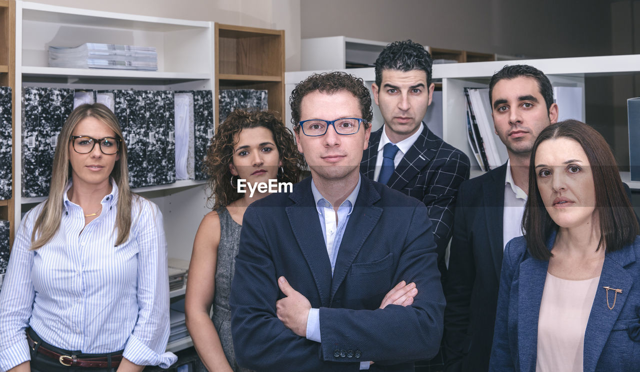 Portrait of business people standing in office