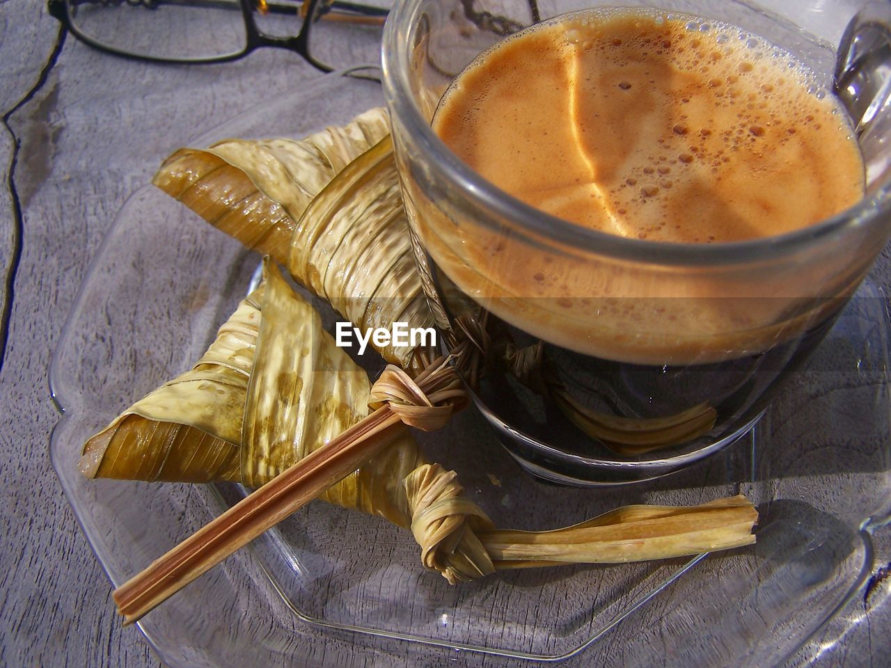 CLOSE-UP OF COFFEE ON TABLE