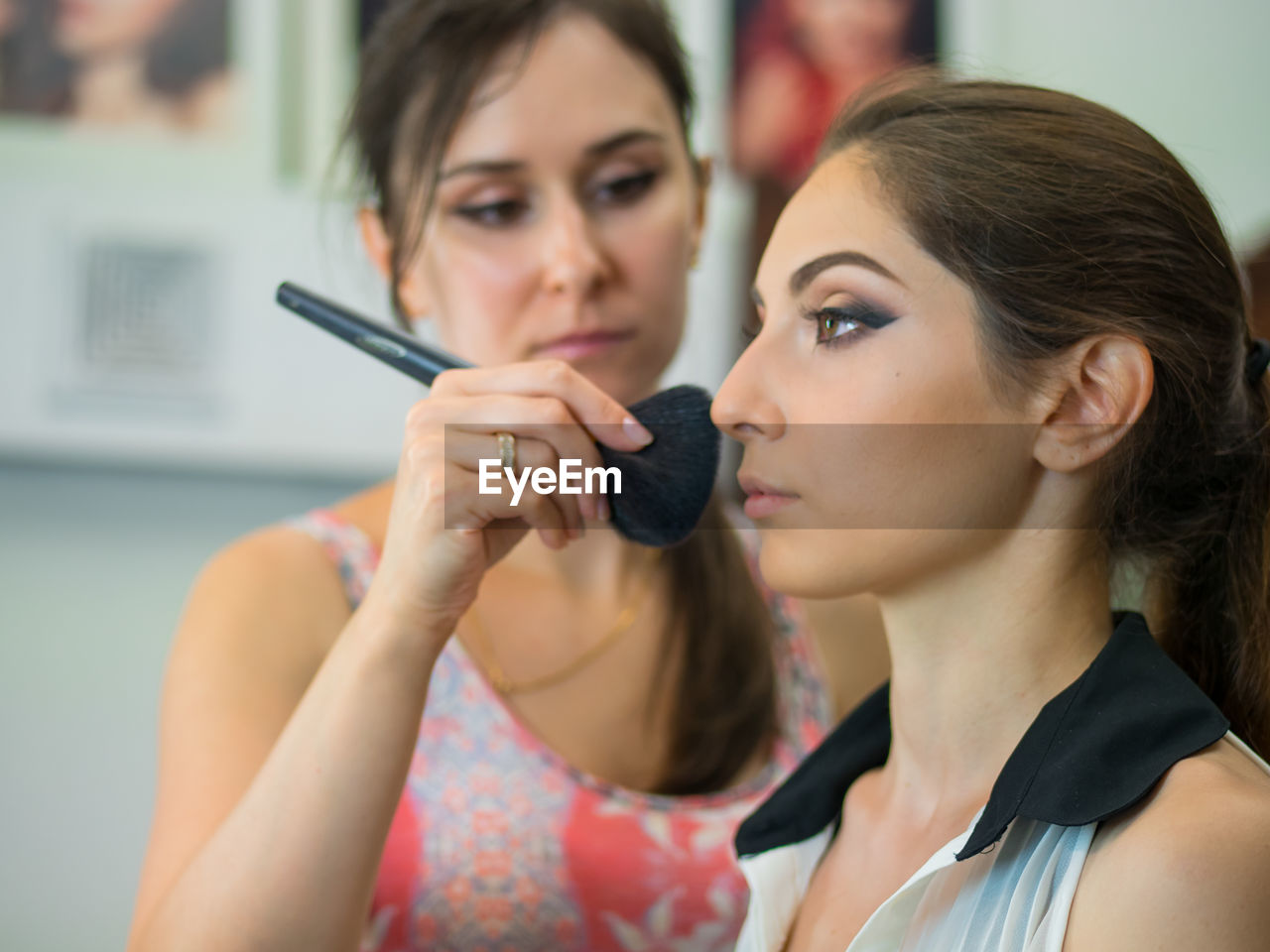 Beautician dressing customer at spa