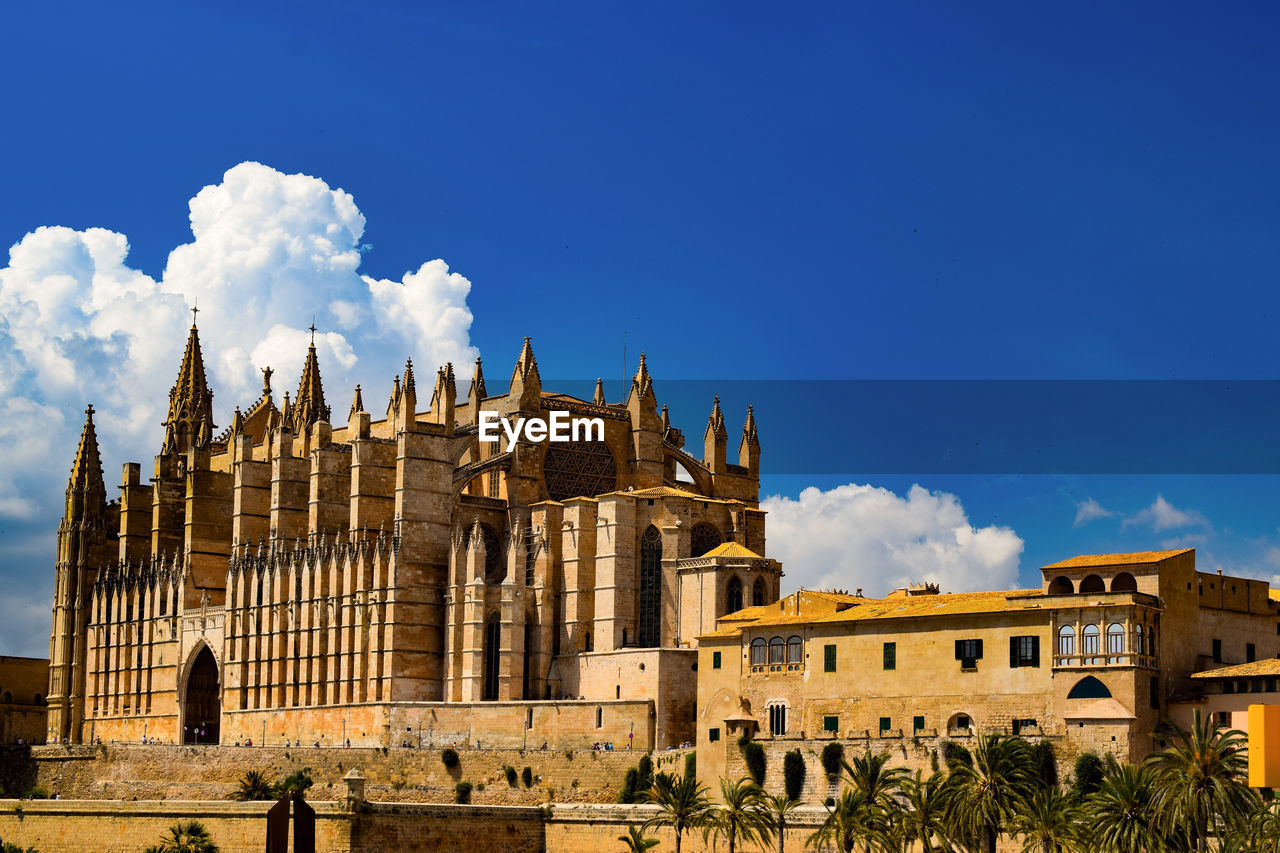 Low angle view of historic building against sky in palma de mallorca