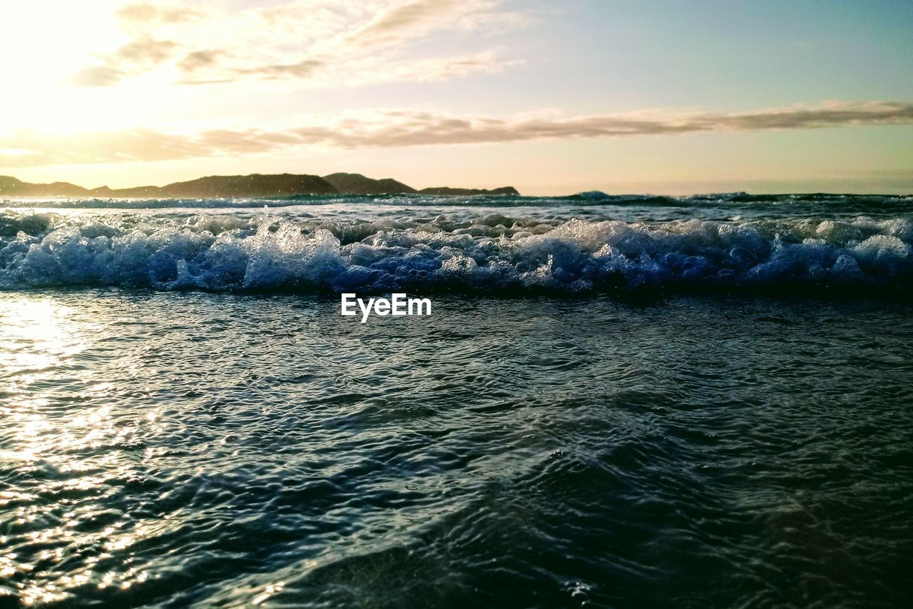 SCENIC VIEW OF SEA DURING SUNSET