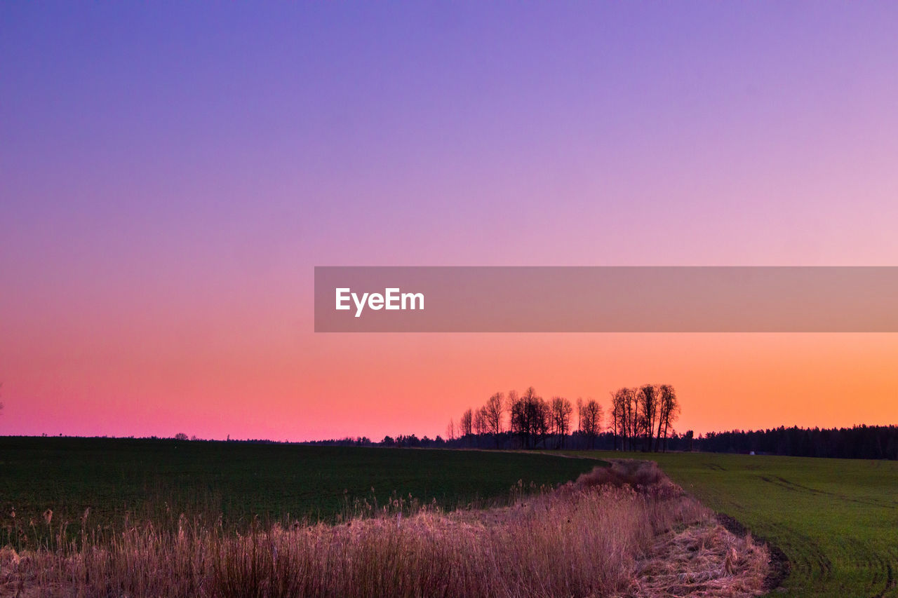 A beautiful spring sunrise with dramatic, colorful sky.