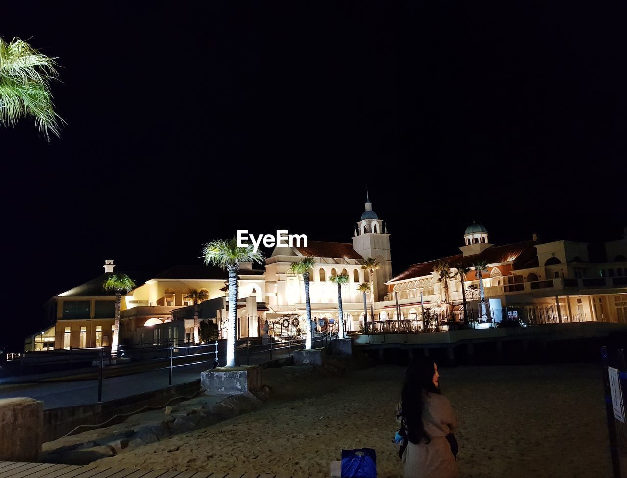 VIEW OF TEMPLE AGAINST SKY AT NIGHT