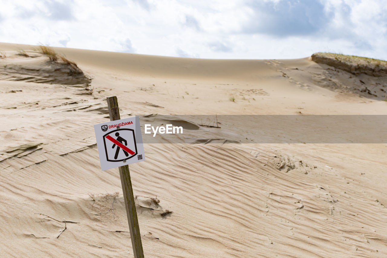 Access prohibited sign or symbol on sand hills dunes, stop, no entry, no walk, no pass