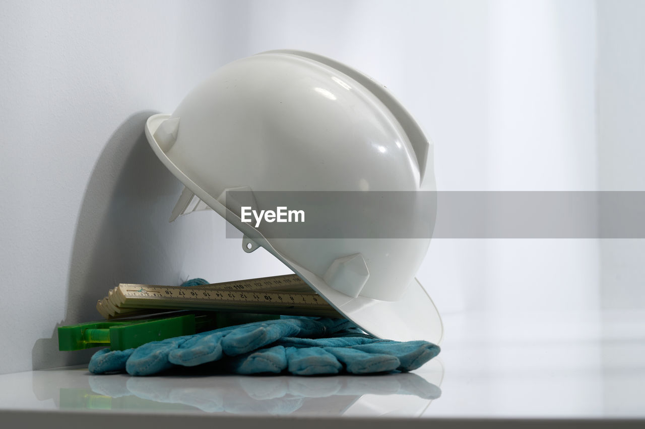 Close up of hardhat with construction tool