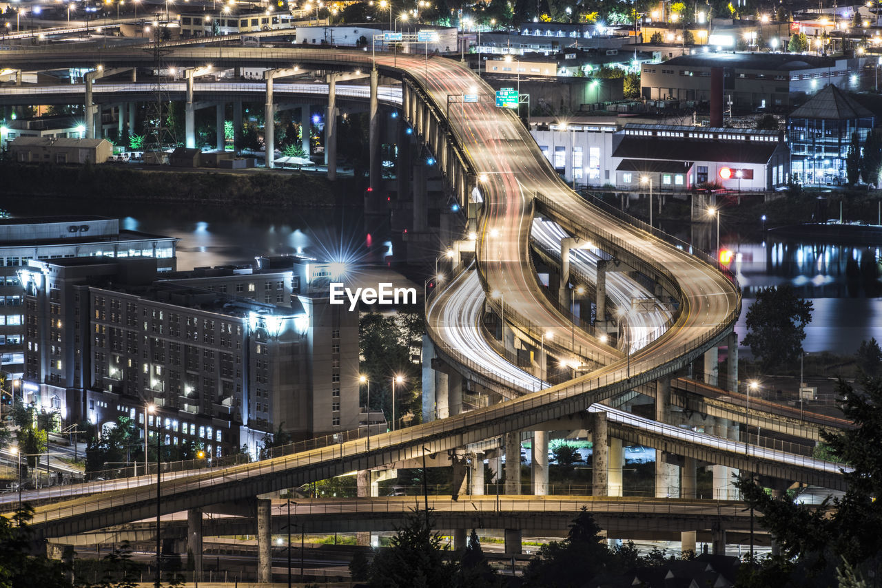 High angle view of elevated roads in city at night