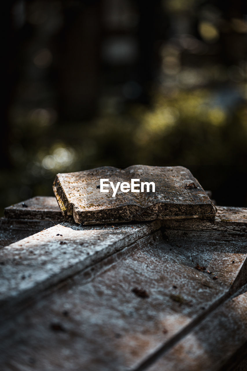 Close-up of rusty metal at cemetery