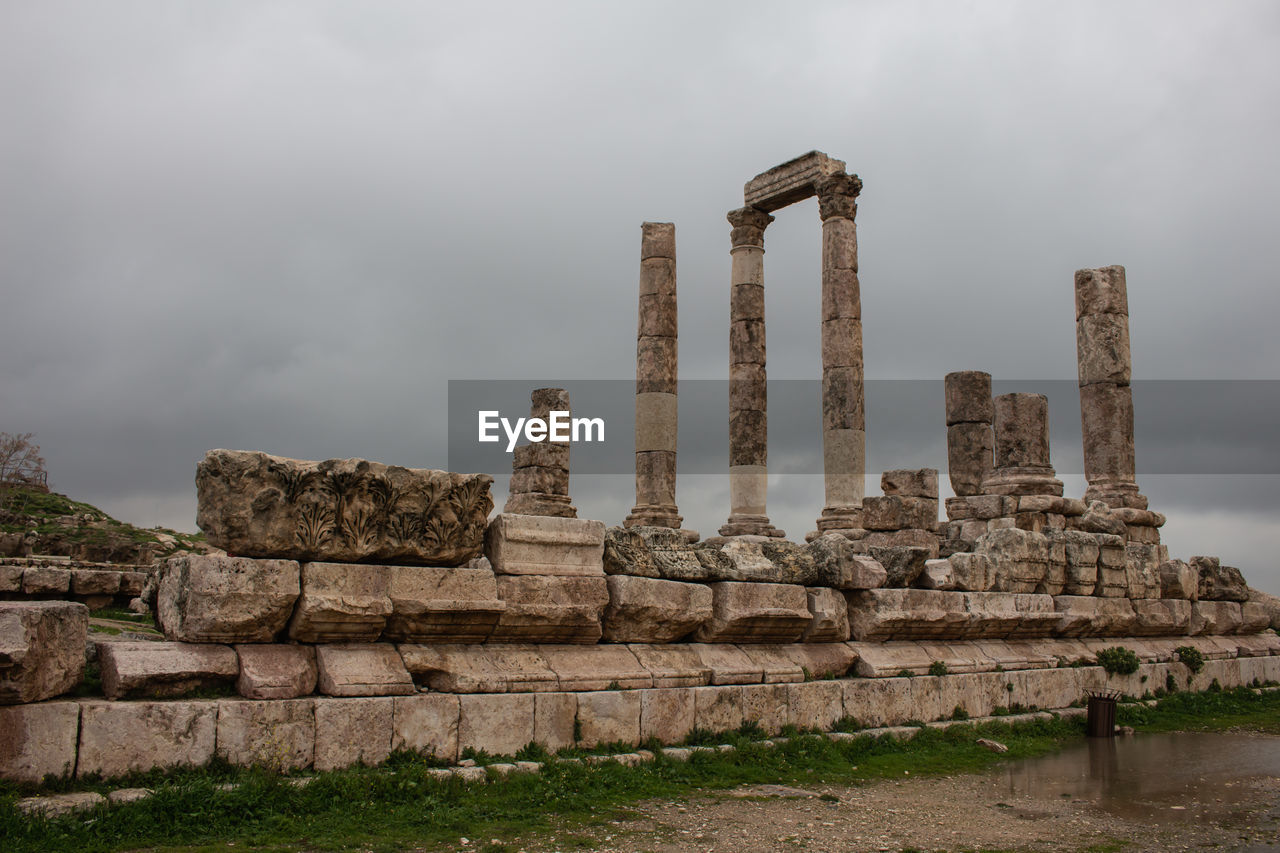 RUINS OF TEMPLE AGAINST SKY