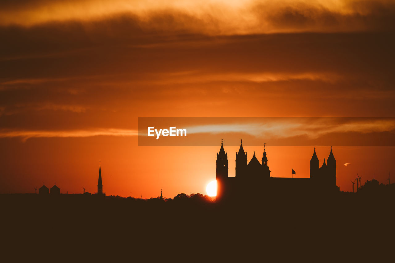 Silhouette of dom st. peter zu worms against sky during sunset