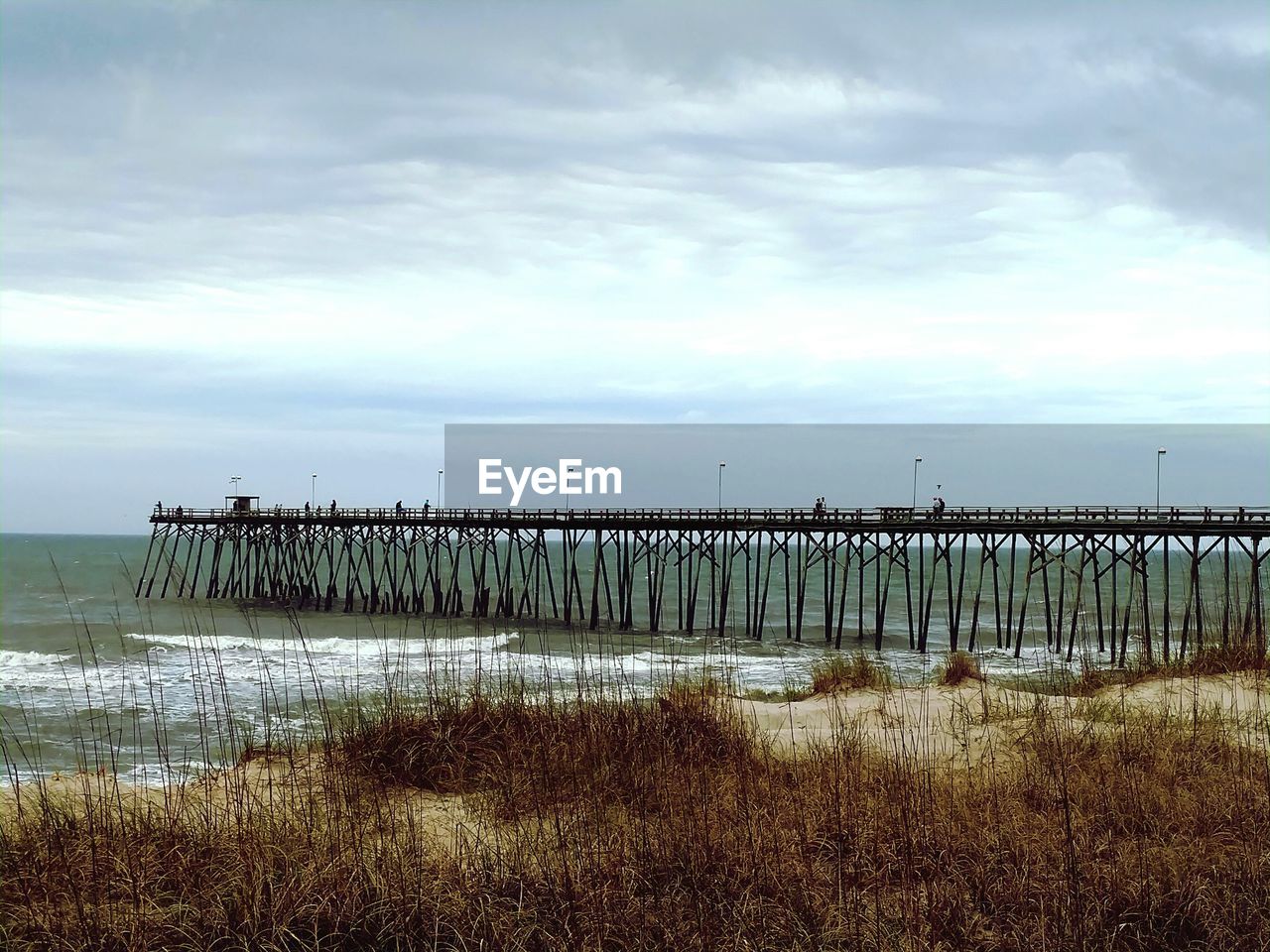 VIEW OF SEA AGAINST CLOUDY SKY