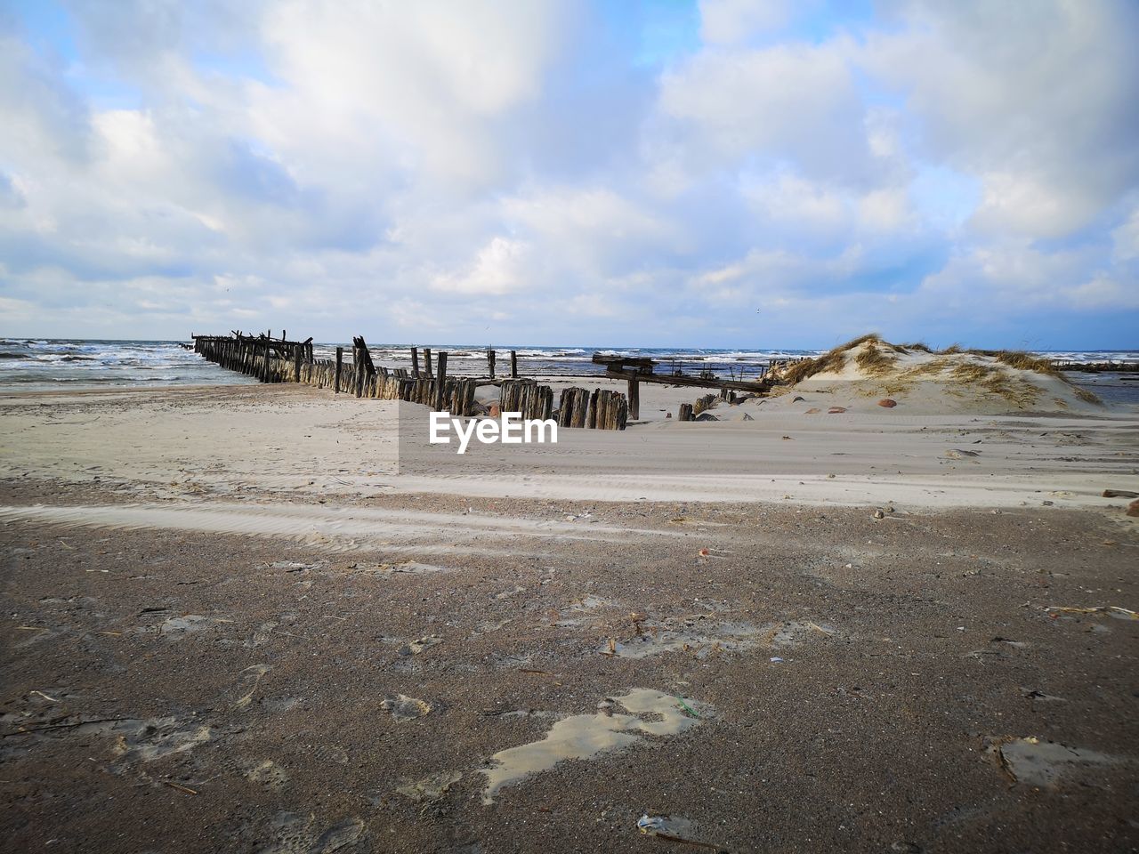 Scenic view of beach against sky
